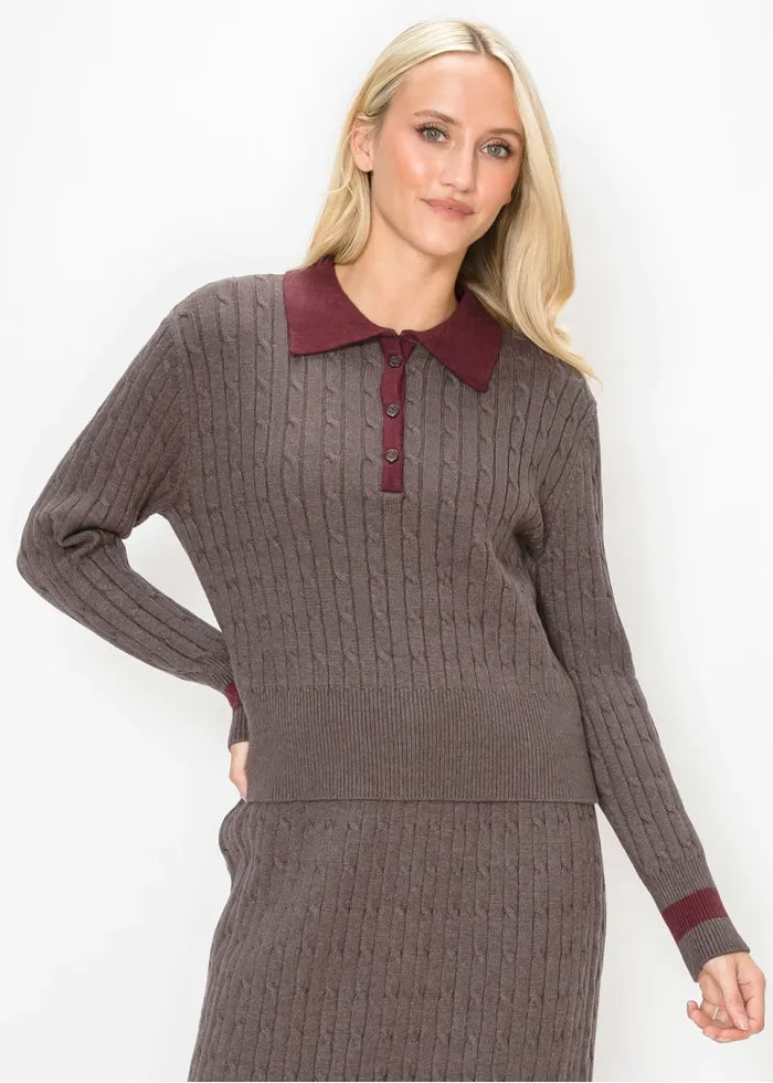 Cable sweater with contrast collar