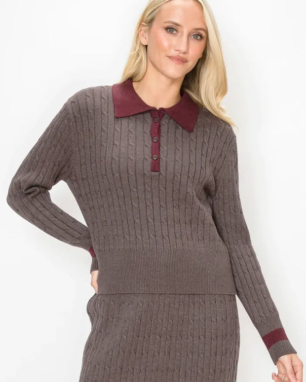 Cable sweater with contrast collar