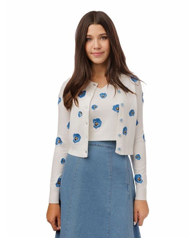 White knit twin set with blue embroidery